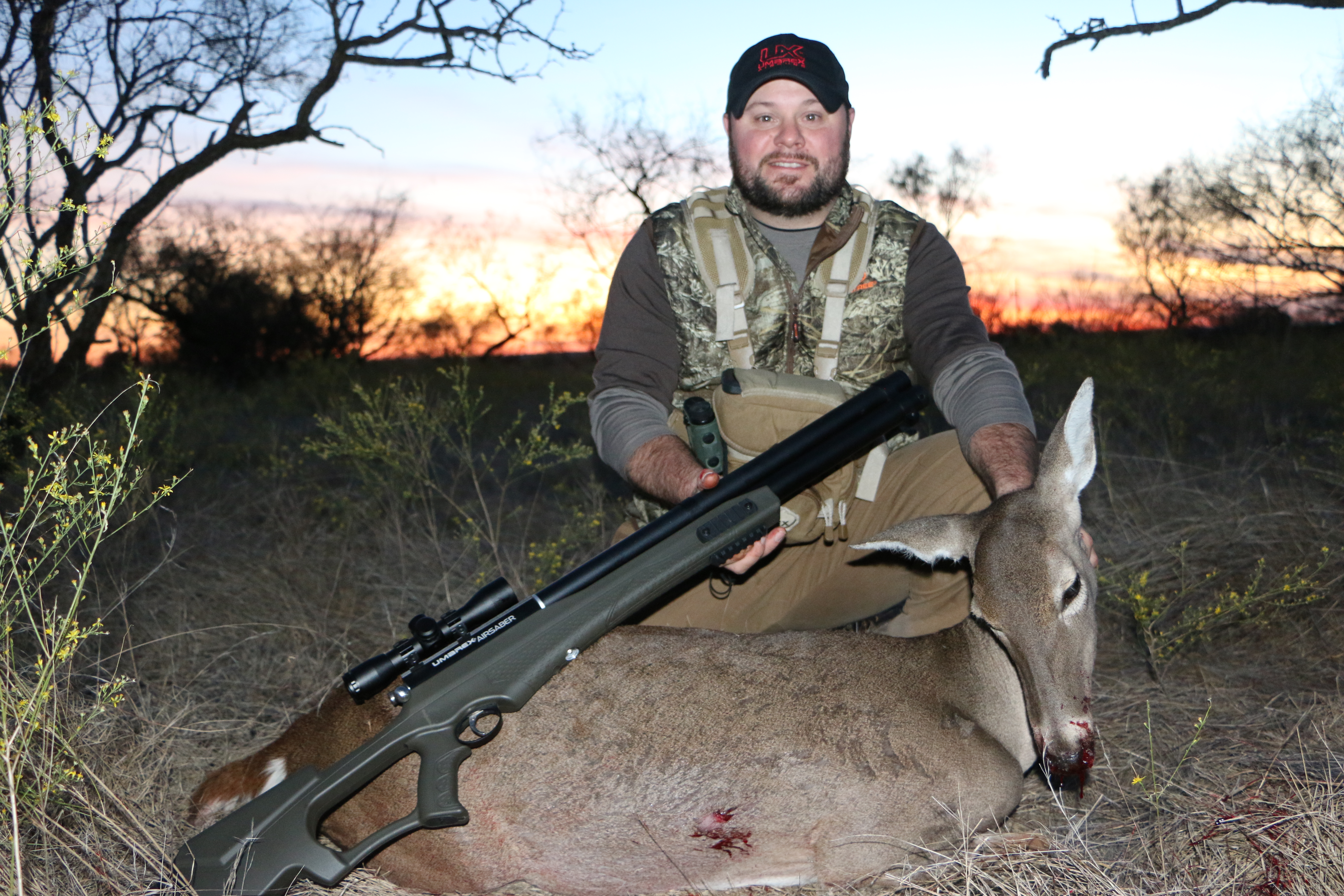 TED NESTOR AND WHITETAIL DOE HE HARVESTED WITH THE UMAREX AIRSABER